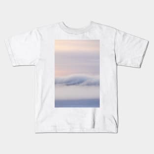 Dreamy thick fog at sunrise over hill Kids T-Shirt